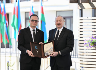 Prezident İlham Əliyev Zəngilan şəhərindəki ilk yaşayış kompleksinə köçən ailələrlə görüşüb